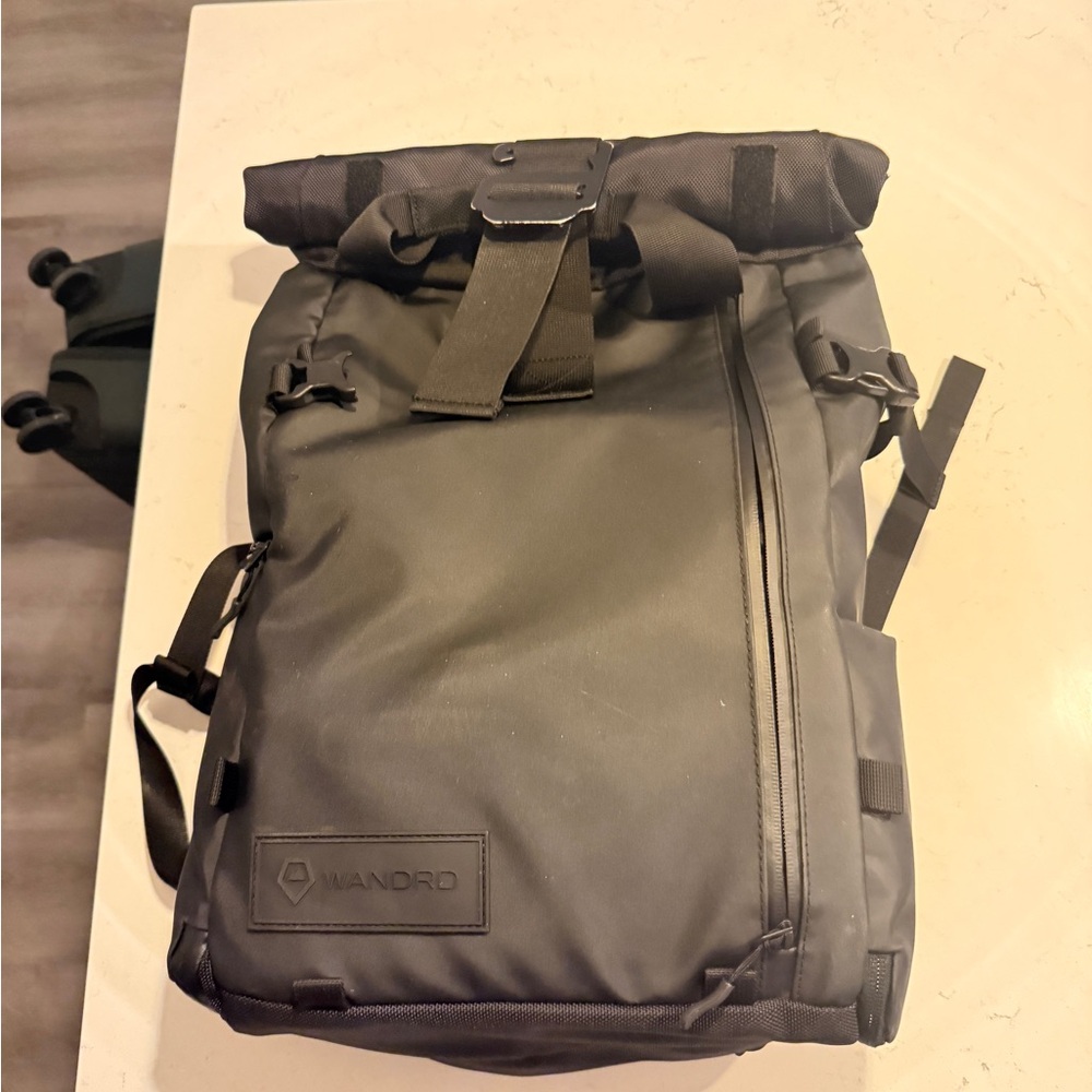 Wandrd Black Roll-Top Backpack